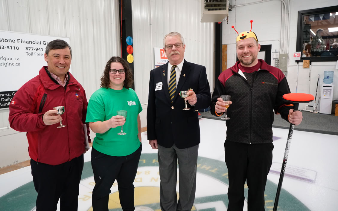 MP Michael Chong sharing a toast with 2023 Curl For A Cause organizers.